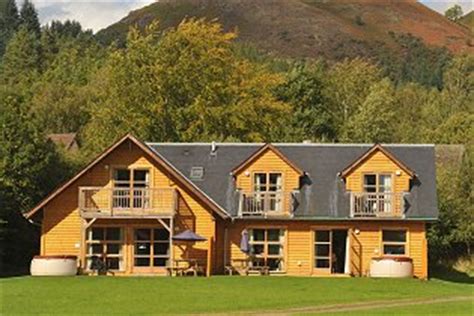 They're set in private grounds, with views over the water and surrounded by woodland and nature reserves. Loch Lomond Waterfront Holiday Lodges with Hot Tubs in ...