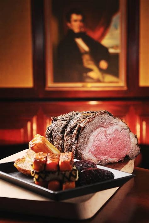 The ultimate guide to perfect prime rib roast! Roast Prime Ribs served with grilled vegetables, roast ...