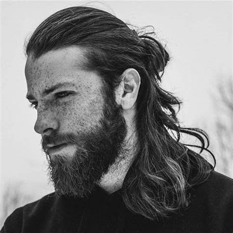Tying the top portion of hair with the world famous hair ties for guys. 50 Best Long Hairstyles For Men (2021 Guide)