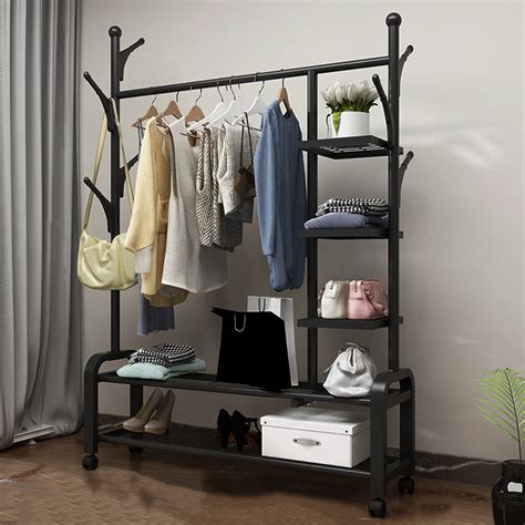 A wide variety of electric hanging clothes dryers rack options are available to you, such as usage, material, and style. Clothing Garment Rack with Shelves, Metal Cloth Hanger ...