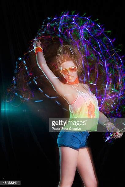 Glow Sticks Dance Photos And Premium High Res Pictures Getty Images