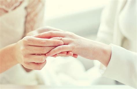 Happy Lesbian Couple Hands Putting Wedding Ring Photos Free And Royalty