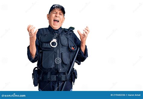 Senior Handsome Man Wearing Police Uniform Crazy And Mad Shouting And