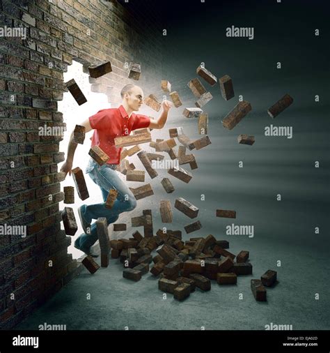 Breaking Through Brick Wall Hi Res Stock Photography And Images Alamy
