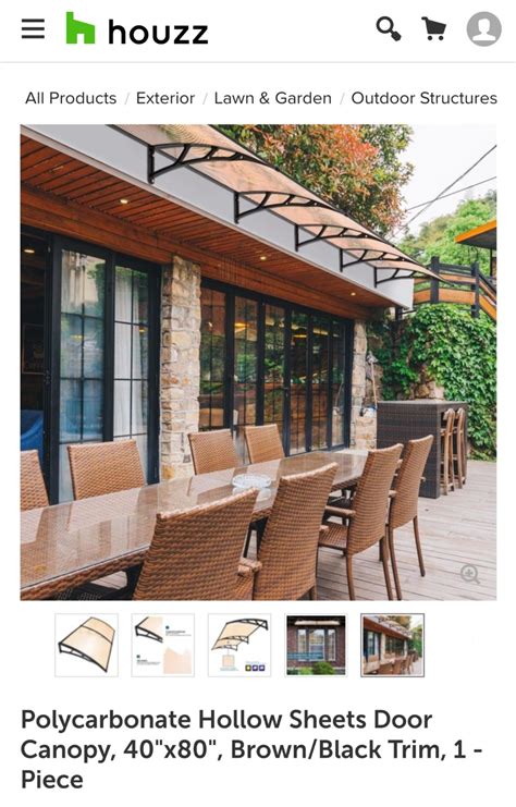 This outdoor daybed is made of durable wicker. Canopy | Canopy, Backyard, Outdoor gardens