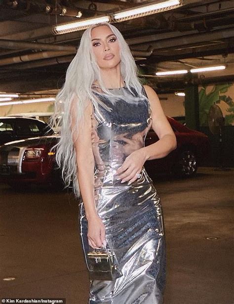 Kim Kardashians Glamorous Photos In A Parking Lot She Looks Slender In A Shiny Silver Dress