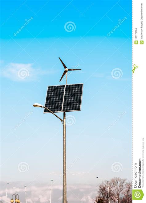 Solar Panel Wind Turbine Under Cloudy Blue Sky Stock Photo Image Of