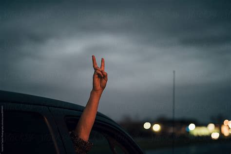 Hand Doing Peace Sign By Stocksy Contributor Itla Stocksy