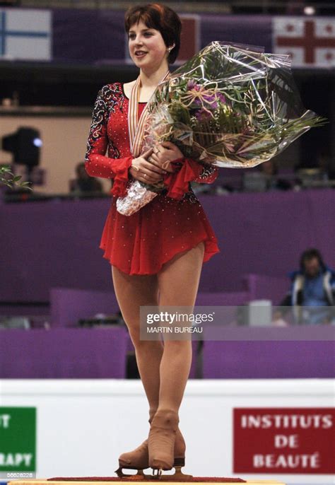 Gold Medallist Russias Irina Slutskaya Celebrates On The Podium