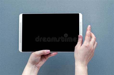 Hands Holding Contemporary Generic Tablet Pc With Blank Screen Stock