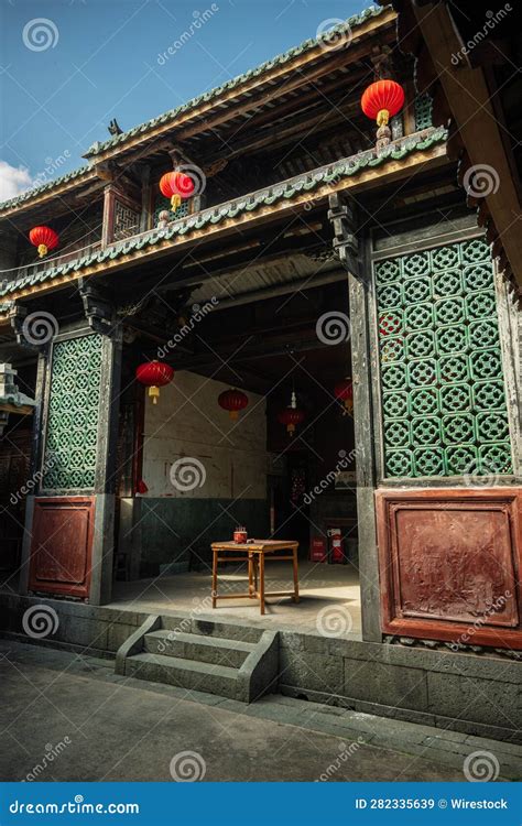 Antique Chinese Building Entrance Adorned With Red Lanterns Fujian