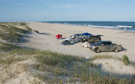 Each cottage has a charcoal grill and picnic table. Outer Banks Camping - OuterBanks.com