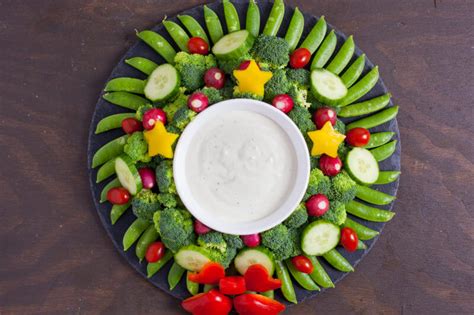 If you want to make sure all diets are catered for, add some of these vegetarian dishes to the feast. Veggie Wreath Cute Christmas Appetizer - Eating Richly