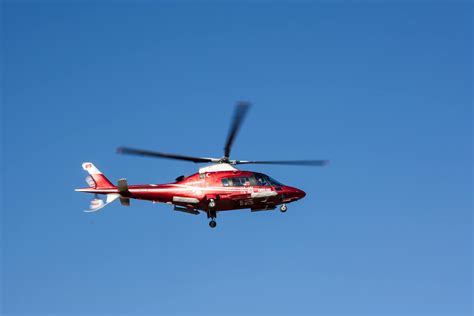 Flying Red And White Helicopter · Free Stock Photo