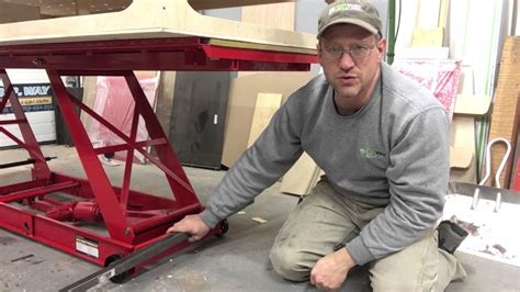 It places your bike at a comfortable (adjustable) height, where you can easily access its components without straining. Turn a Harbor freight motorcycle lift into a plywood lift feed table for wood shop - YouTube