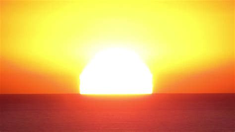 Royalty Free A Time Lapse Of The Large Orange Sunset As The 5307365