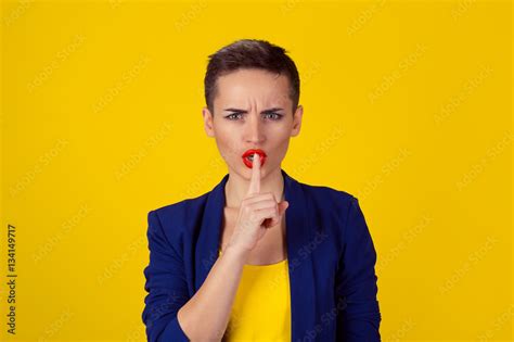 Shh Woman Wide Eyed Asking For Silence Or Secrecy With Finger On Lips