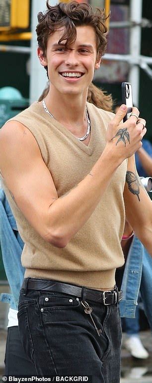Shawn Mendes Shows Off Toned Arms In Clinging Nude Tank Top As He