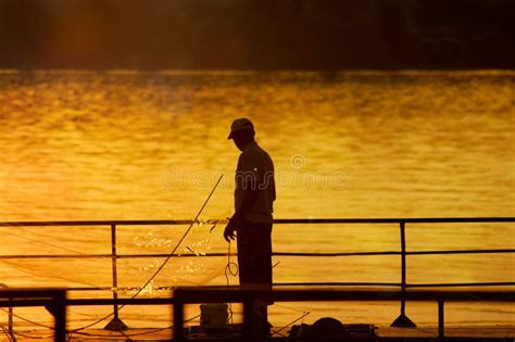 Fisherman In The Sunset Stock Photo Image Of Toil Lakes 33676076