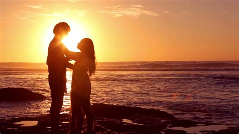 couple silhouette at the beach sunset light stock footage video 3599840 shutterstock