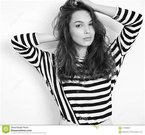 Girl With No Makeup In Summer Hipster Clothes Posing Near Wall Stock