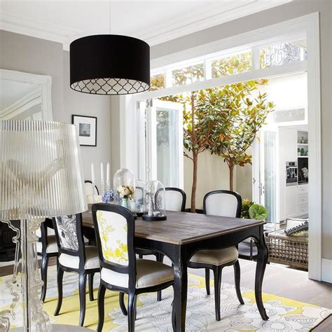 Yellow And Black Dining Room With French Dining Table Contemporary