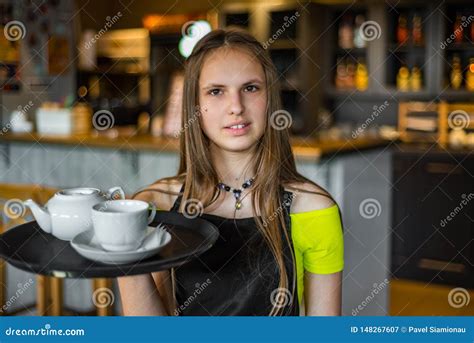 Portrait Young Waitress Standing In Cafe Girl The Waiter Holds In