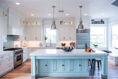 Kitchen island with built in seating might look like a weird idea for your kitchen, but if you have enough space you need to consider this option. Image result for blue and white kitchens | Coastal kitchen ...
