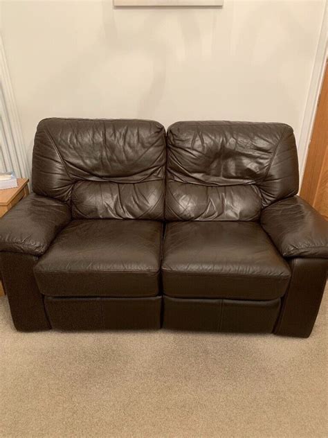 Dfs Brown 2 Seater Reclining Leather Sofa In Lostock Hall Lancashire