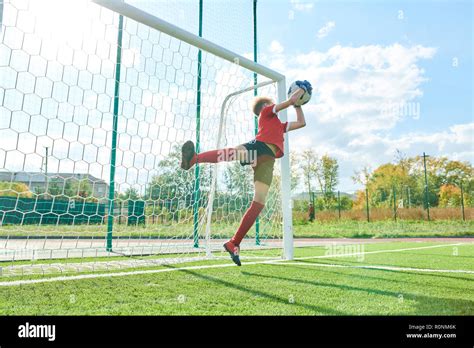 Goalkeeper Catching Ball Stock Photo Alamy