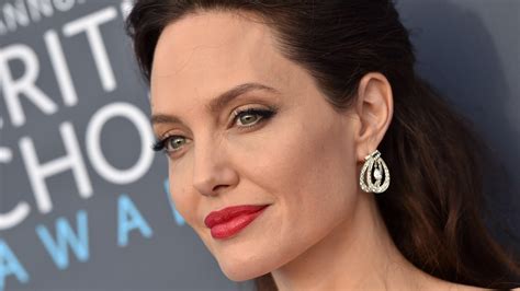 see angelina jolie in curly blonde wig for role in come away allure