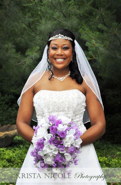 a glowing bride after her wedding at masso s catering in glassboro nj purple and white silk