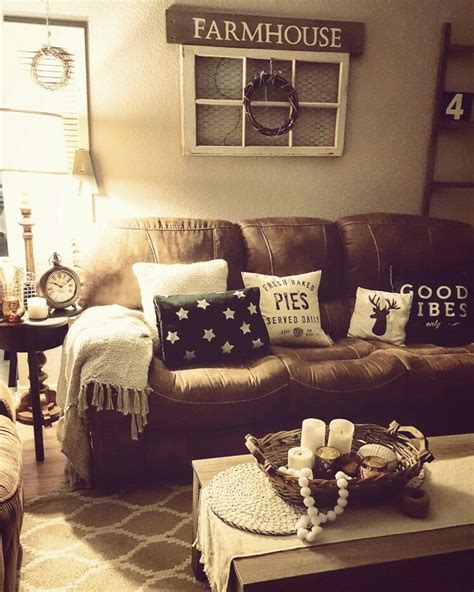 The coffee table may become the most unique piece here. Rustic living room, farmhouse, brown couch, cozy home ...