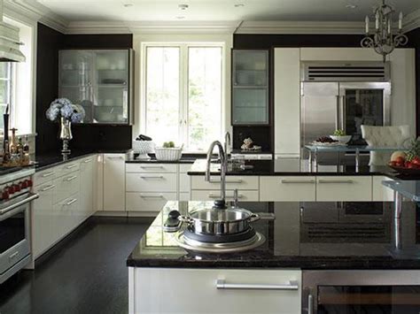 Black kitchen countertops have a sleek and stylish look and that's true in most cases, regardless these minimalist and stylish black kitchen cabinets and this chic island have matching wood for example, even something as simple as the white veining on the black countertop and backsplash. Black Granite Countertops - a Daring Touch of ...