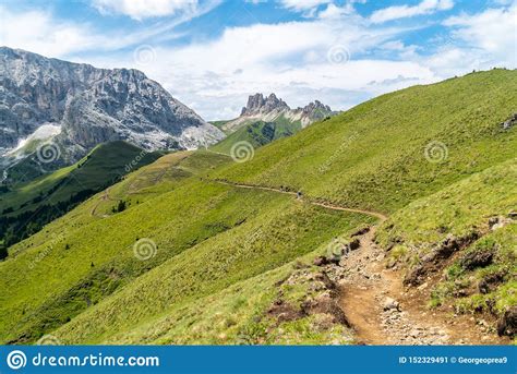 Hiker On The Ridge Of Dolomites Mountains In Alps Italy Via Ferrata