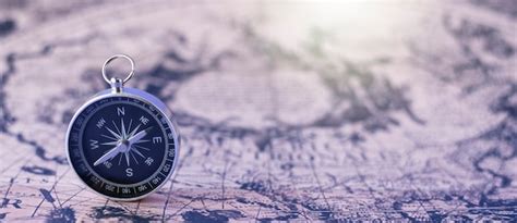 Premium Photo Compass On Map Background Travel Geographic Navigation