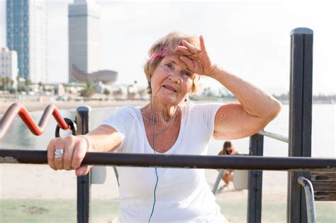 Waist Up Portrait Of Mature Sportswoman On Beach Stock Photo Image Of Briton Sportswear