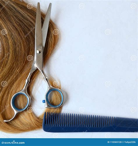Strand Of Hair With Scissors And Comb For Haircut Stock Photo Image