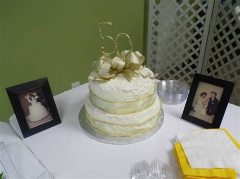 The moment of anniversary requires a lavish arrangement and cakes play a key role in that for sure. 50th Anniversary Cake at our parents' 50th ~ Pink Lemonade layers with Lemon Buttercream icing ...