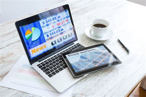 Stock Market Trading App On A Tablet Pc And Laptop Pc Stock Image
