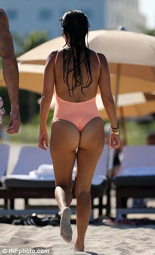 Kourtney Kardashian Flashes Her Behind In A Thong Bathing Suit In Miami Daily Mail Online