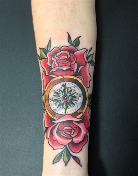 A clock and a compass together can serve as a big reminder that we have limited time in our lives to get where we're going. compass wrist - TATTOO ZOO