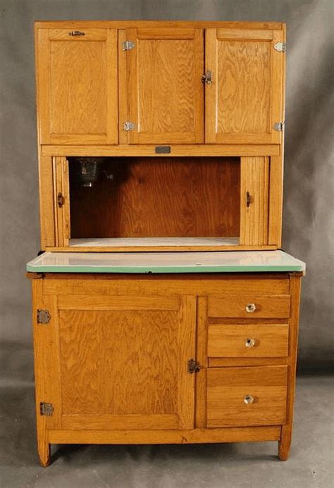 Available for your bidding pleasure we have this early 1900's oak full size hoosier cabinet.many homes were; 