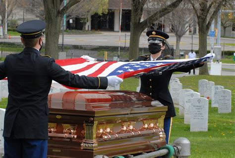 Honor Guard Soldiers Provide Socially Distanced Final Salute Article