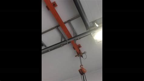 Unistrut Railing And Chain Hoist Trolley Thru A Garage Door Track Youtube