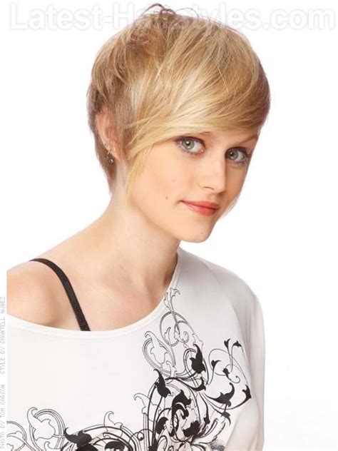 This neat and cute short hairstyle is nice with side parted fringes. Time to Write: Long Pixie