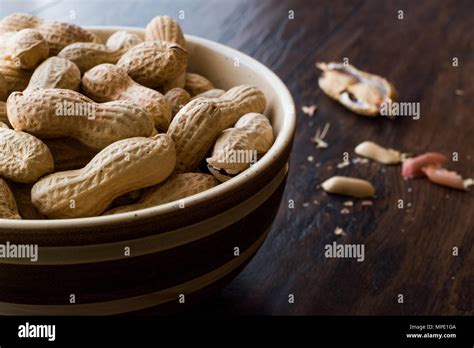 Bowl Of Dry Salted Roasted Peanuts In Shell Organic Food Stock Photo