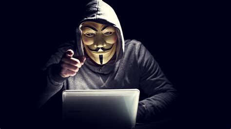 1920x1080 Anonymus Hacker In Mask Pointing Finger Laptop Full Hd 1080p