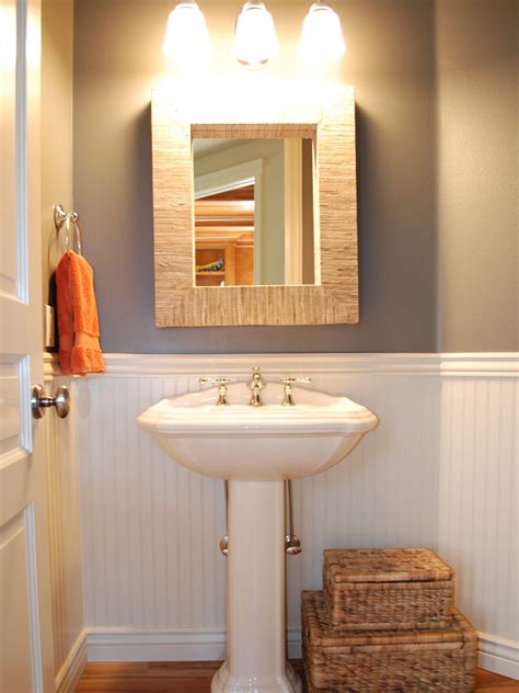 Cottage Powder Room With White Wainscoting And Storage Baskets Guest