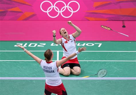Christinna Pedersen And Kamilla Rytter Juhl Of Denmark Celebrate Victory In Their Womens
